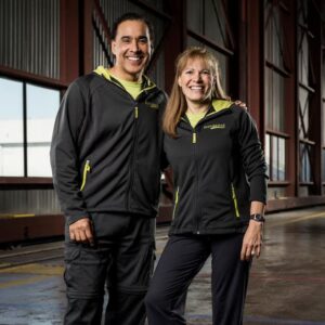Hal Johnson and Joanne McLeod standing side-by-side posing for a photo.