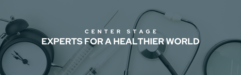 Banner that reads "Center Stage Experts For A Healthier World" in bold white text. In the dark transparent background are a variety of medical tools.
